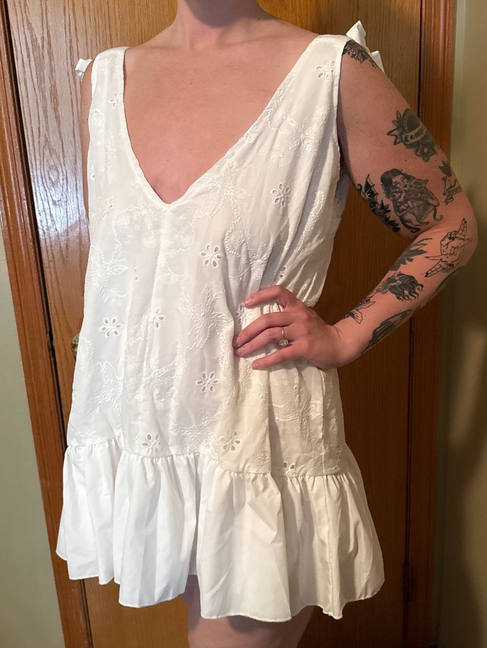White Sleeveless Ruffle Hem Dress with Floral Embroidery and Shoulder Ties